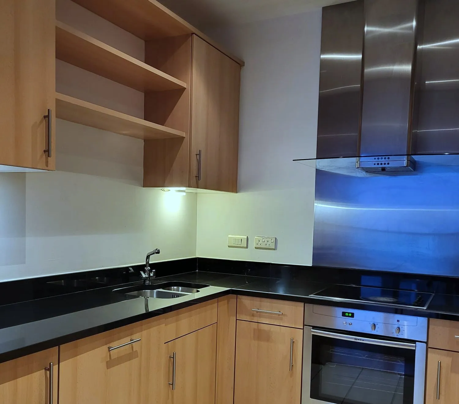 Kitchen worktop, sink and hob after a deep clean